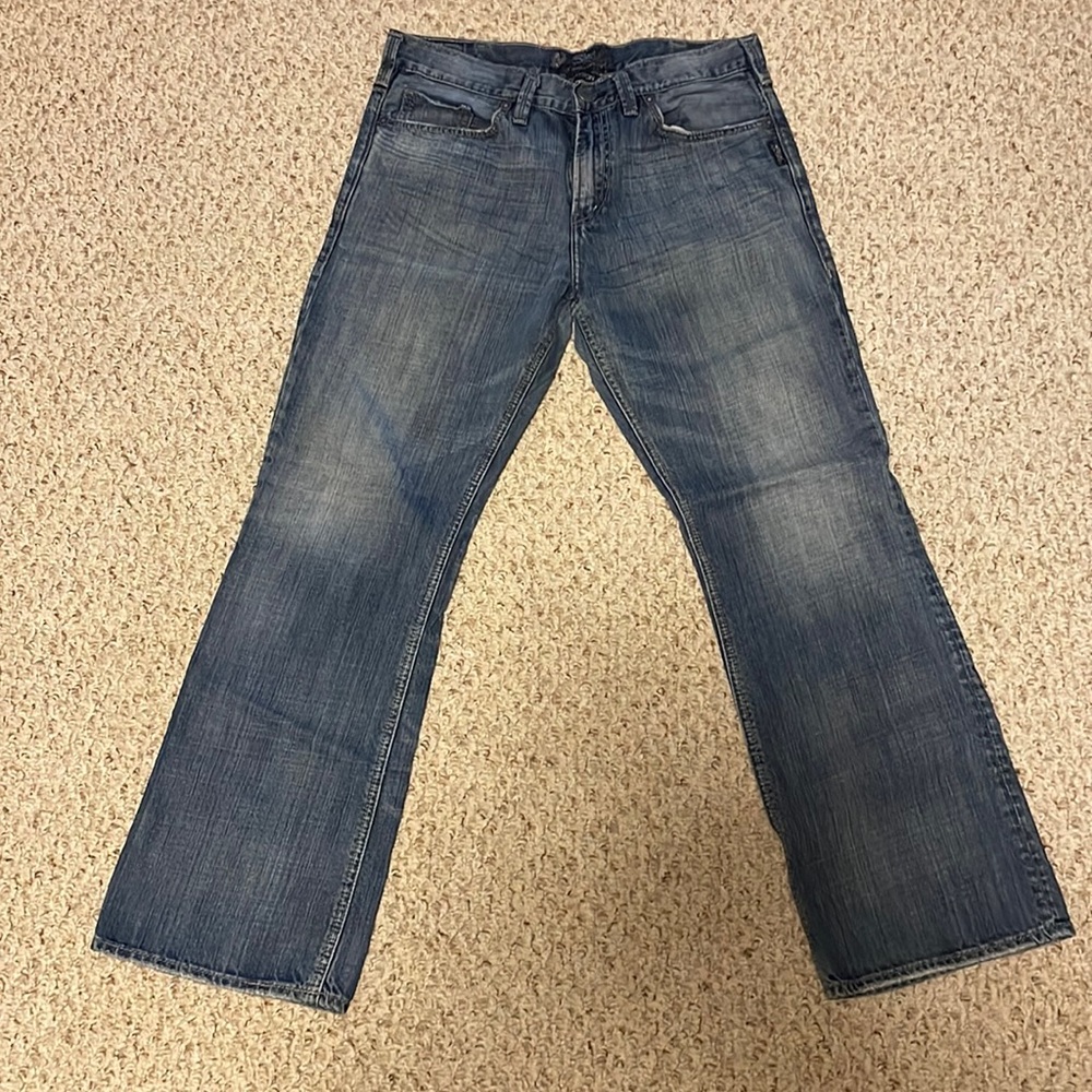 Men’s Silver “Grayson” fit jeans. Size 33x32.